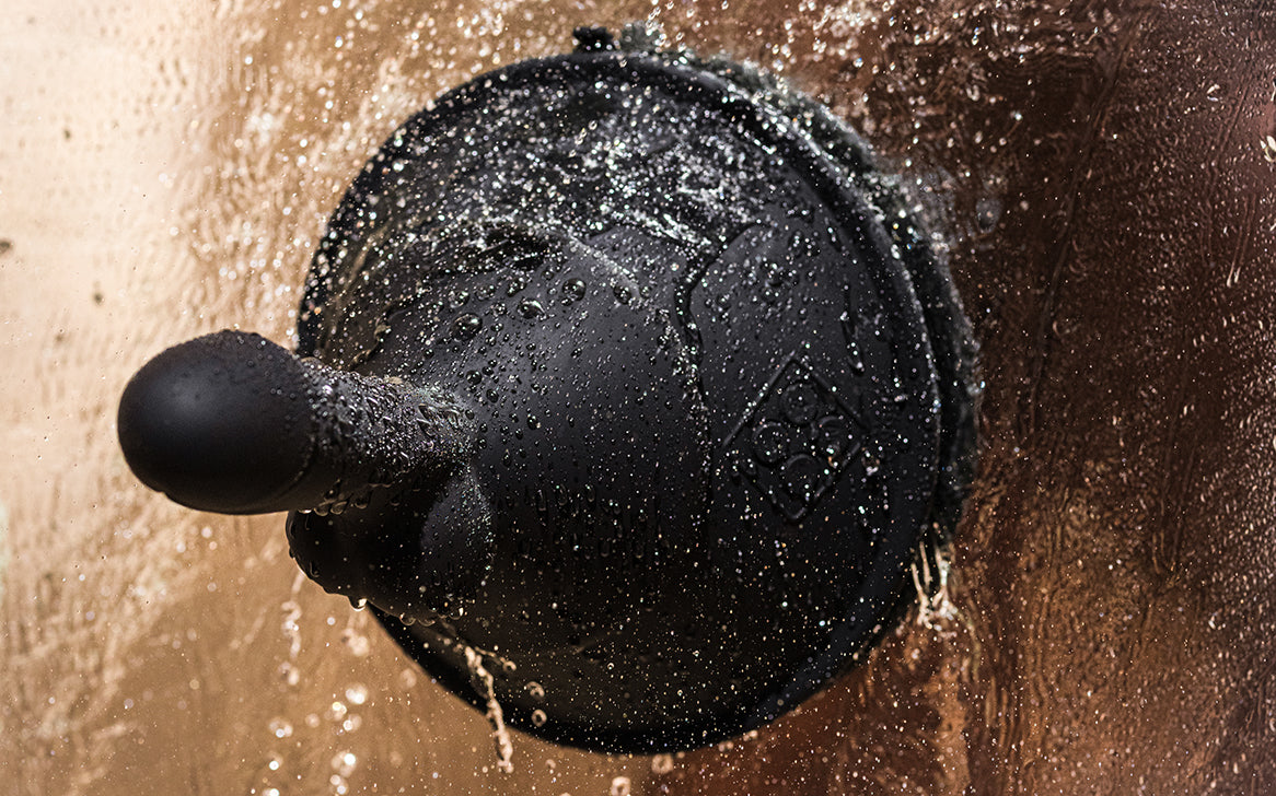 The Cowgirl Cone suctioned to a wet shower wall